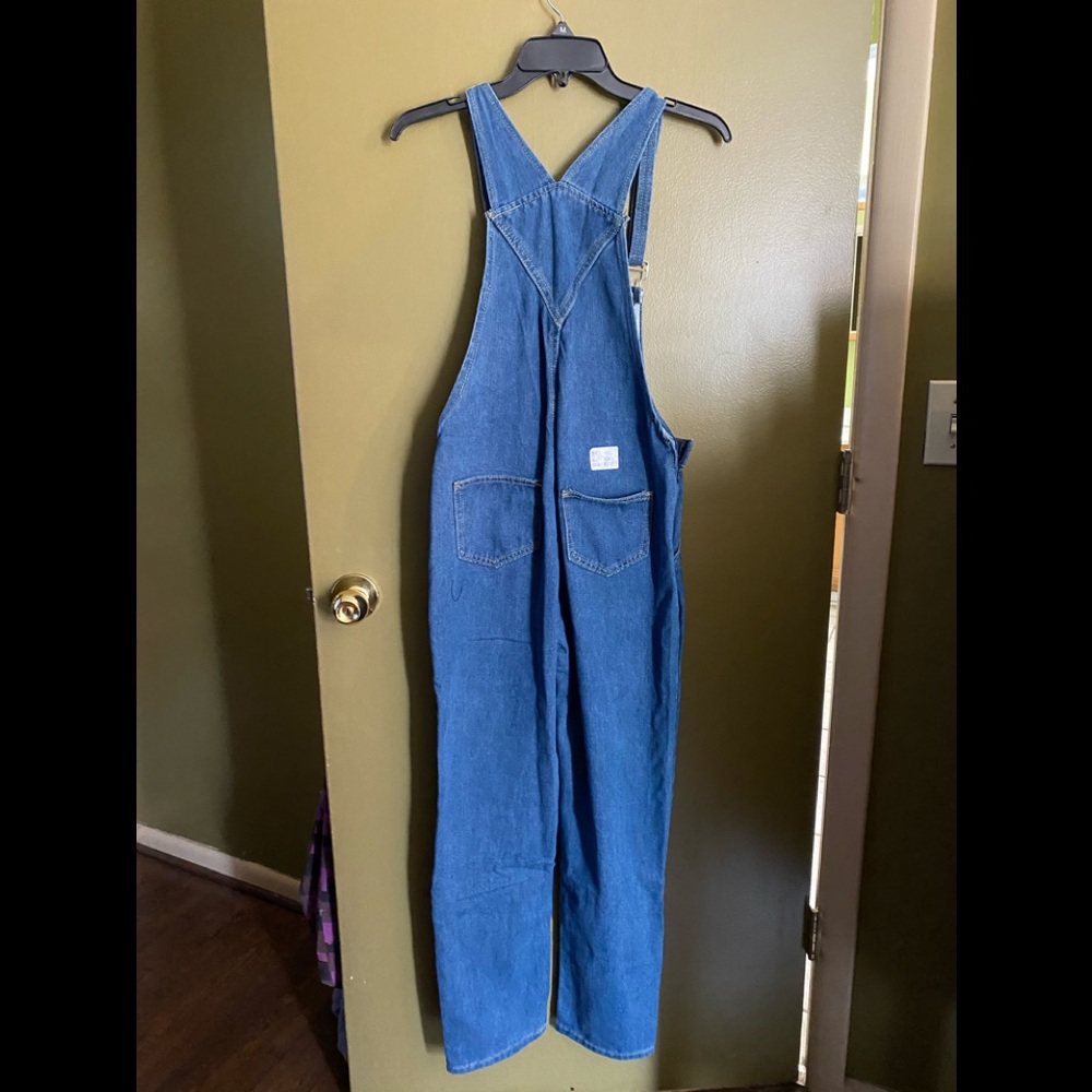 Denim overalls.